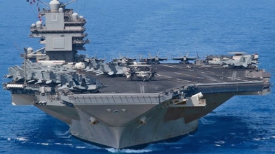 The USS Gerald Ford returns wounded to Crete: The $20,000 Iranian drone attack and... arson