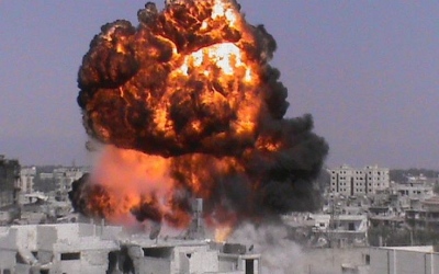 Blood and despair in Syria: Thousands of Kurds flee Aleppo as clashes rage and Israel watches